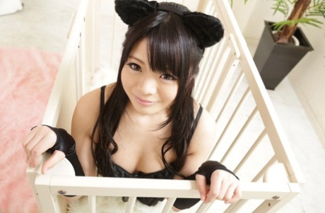 Dark haired Asian babe Rinako gets fucked and creampied wearing stockings
