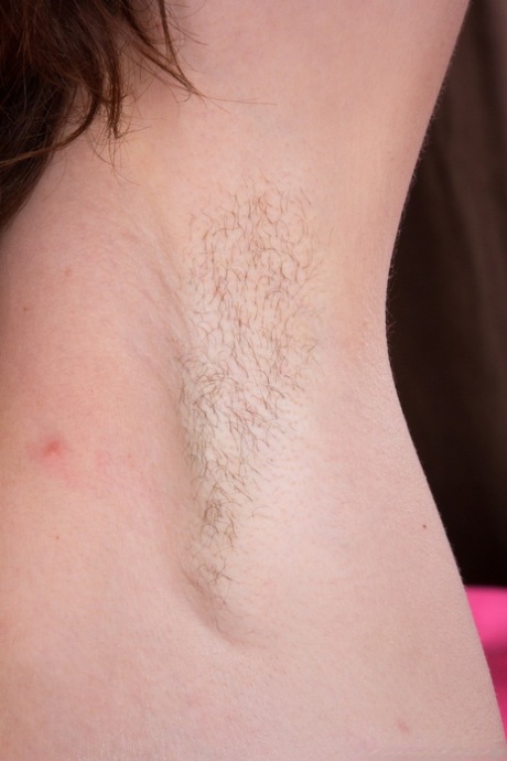 Horny maid Candy Smith doffs her uniform to drive a dildo in her hairy twat