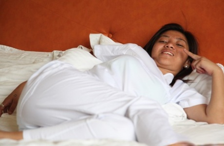 Sexy young filipina nurse Joanna doffs uniform pants to show her trimmed pussy