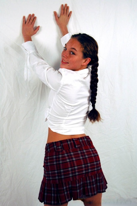 Pigtailed & freckled cutie Ashley Gracie flashes hot ass in schoolgirl outfit