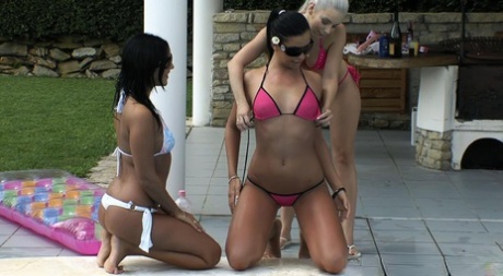 Hot honeys Larissa Dee and Peaces eat pussy in a lesbian outdoor orgy