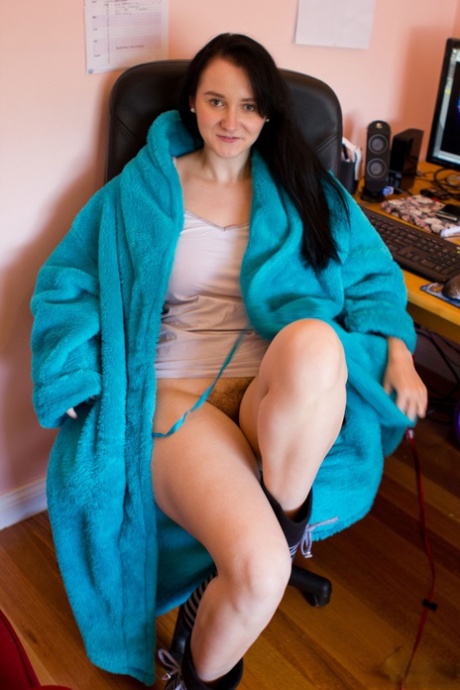 Raven haired girl with natural tits Aeryn Walker shows her ass and bushy pussy
