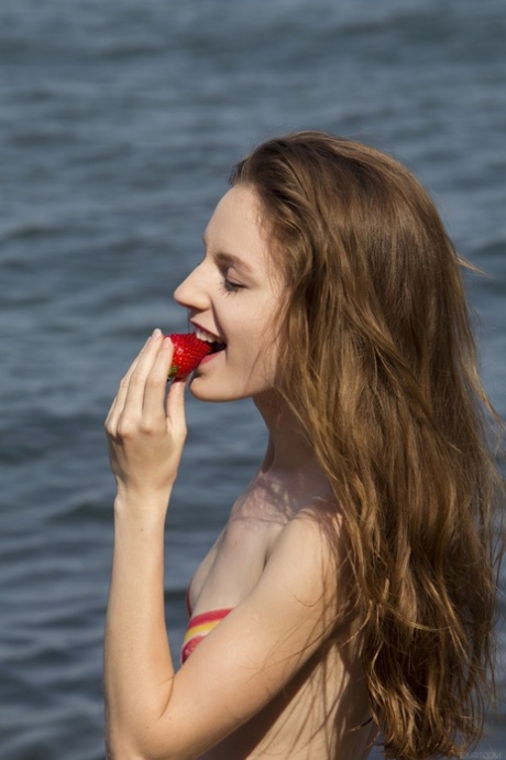 Ukrainian teen Sofi Shane loses her tiny bikini & fingers herself on the beach
