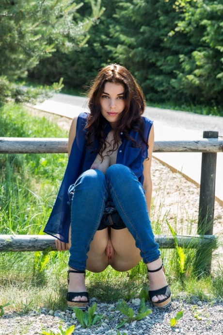 Ukrainian Evita Lima strips off her jeans outfit and exposes her big tits