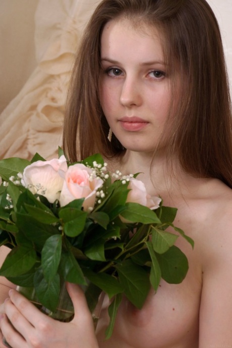 Shy beauty Victoriya A shows her puffy nipples and fuzzy coochie in a solo