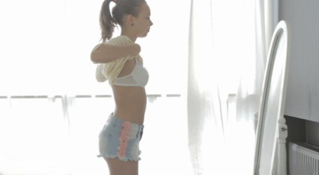 Russian babe Candy Julia takes a sweet dong in her cunt and enjoys a creampie