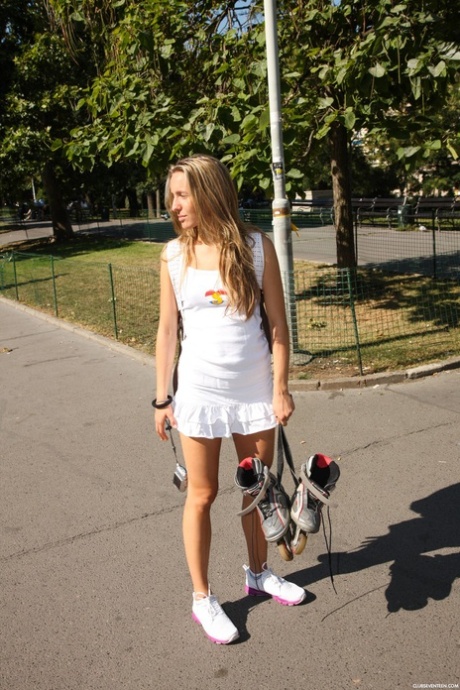 Four sweet teens expose their skinny bodies and small tits on roller blades
