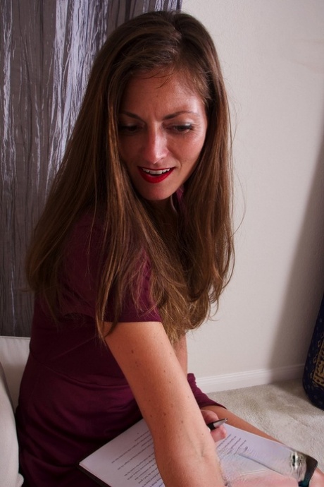Dark haired lady Lauren strips to show her small breasts and hairy crotch