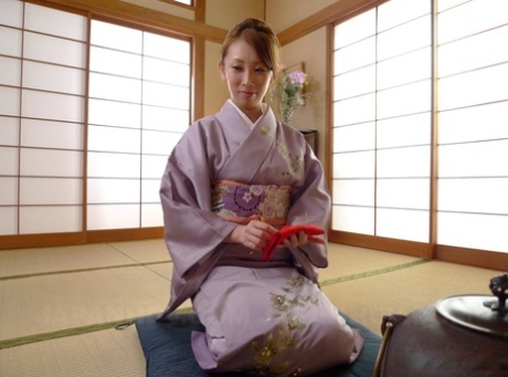 Asian wife Yui Saejima drops her robe and gets rammed by two guys