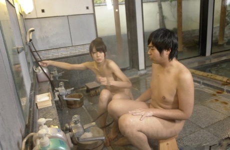 Japanese wife with small tits Rin Hitomi gives a handjob before riding a dong