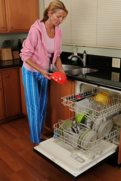 Mature wife Pam stripping and flaunting her hot ass and boobs in the kitchen