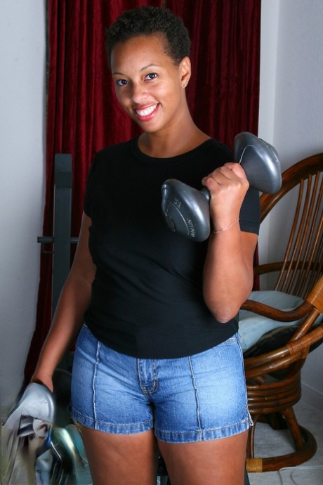 Short-haired ebony Stacy J shows her big ass & pink cunt after working out