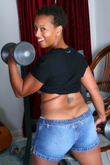 Short-haired ebony Stacy J shows her big ass & pink cunt after working out