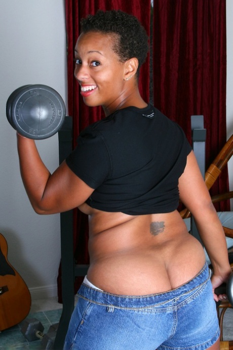 Short-haired ebony Stacy J shows her big ass & pink cunt after working out