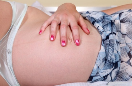 Pregnant MILF Wiska shows her puffy nipples & her very inviting pink twat