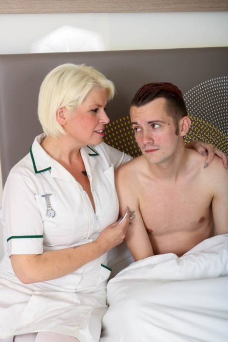 Mature nurse Skyler gives a young patient a therapeutic blowjob & fucks him