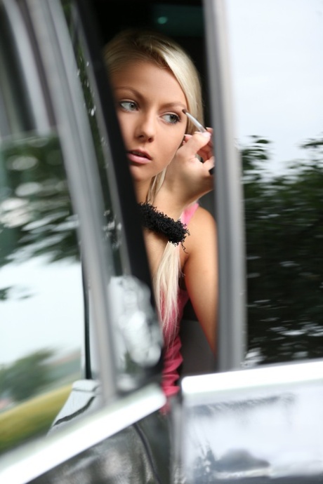 Beautiful blonde Grace peels off her tight dress in public and poses nude