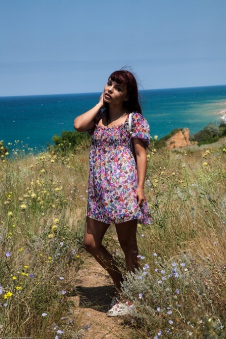 Petite Mulatka showing her tanned tits & fingering her horny pussy outdoors