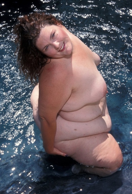 Playful BBW Aurora Spivey washes her huge body and pussy in the pool