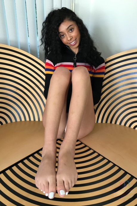 Sweet ebony teen with curly hair Jada Doll flaunts her bushy clam