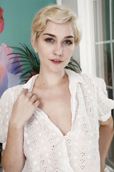 Short haired babe amateur Skye Blue doffs her clothes & shows her tits & twat