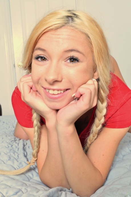 Teen Kenzie Reeves displays her meaty pussy through her crotchless panties