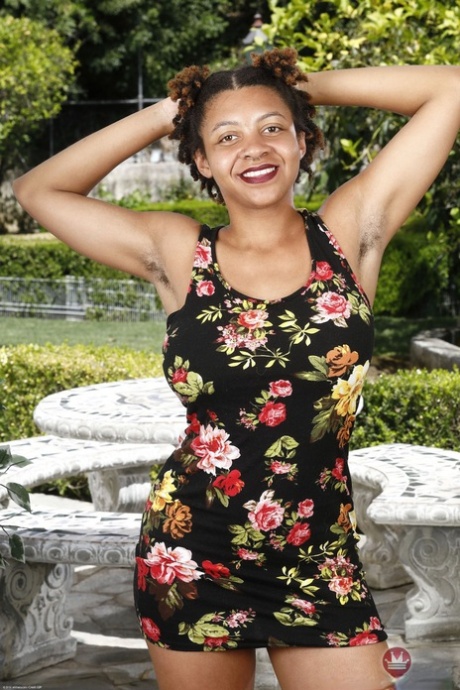 Afro-American cougar Oya flaunts her fuzzy snatch and big breasts outdoors