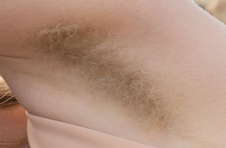 Petite ginger Vestacia JonQuil exposes her big tits and hairy pussy in nature