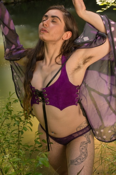 Amateur girl with natural boobs Kisa Fae undresses and flaunts her bush