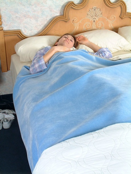 Sleepy Caucasian babe Andy rubs her hairy snatch and shows off her big ass