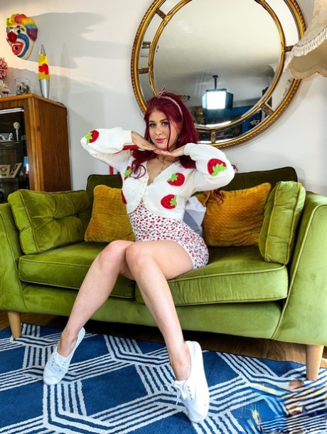 Redheaded doll Atlanta Moreno shows her big tits, ass and pussy
