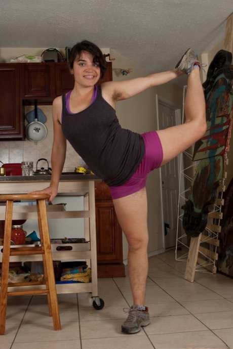 Fit brunette Hickory takes off her workout outfit to show her hairy pussy