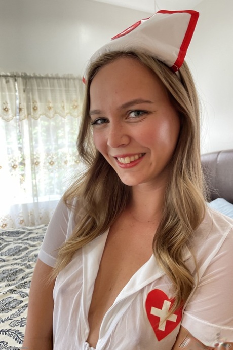 Cute amateur Stella Sedona shows her big booty & asshole in a nurse costume