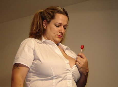 Fat amateur with pigtails Amber shows her hairy pussy and gets spanked