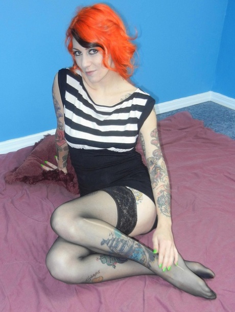 Tattooed redheaded MILF Scarlett Storm gets boned by an old man with glasses