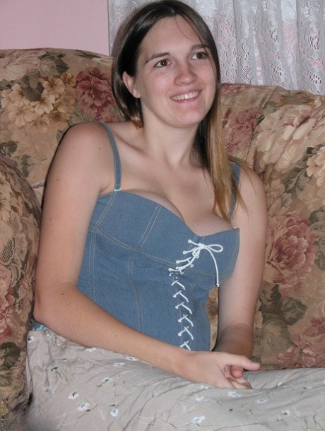 Pretty pregnant teen Natalie strips & spreads her pink pussy on the couch