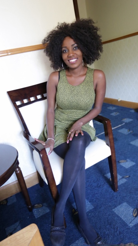 Ebony amateur with crazy hair Fifi shows her big tits before hot POV sex