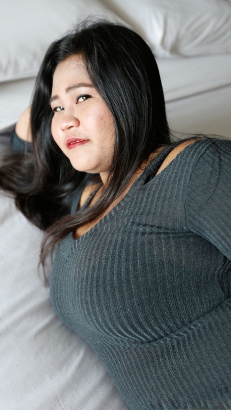 Chubby Asian Nun C unveils her big natural tits and fucks in POV