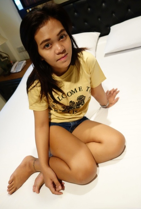 Petite Asian teen Rini B gets her hairy coochie boned and creampied