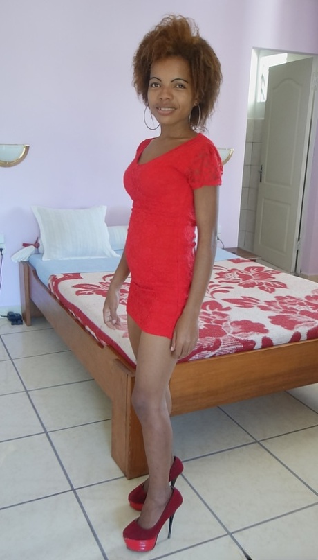 Petite ebony Marina welcomes a big white dick into her chocolate pussy
