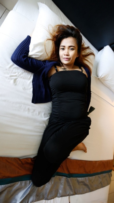 Stacked Asian babe Dear B shows off her big tits & her hairy pussy before sex