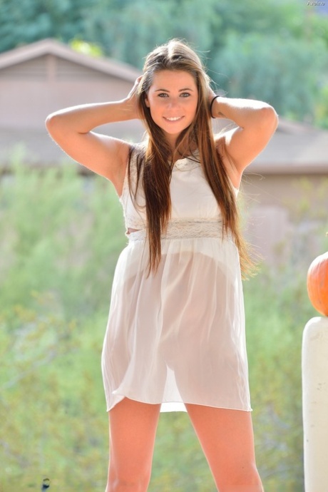 Glamour babe in a see-through dress Aveline flashing an upskirt in public