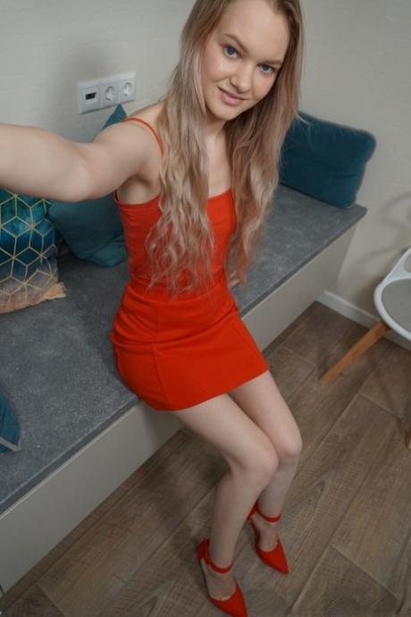 Adorable amateur babe flaunting her boobs and round booty in a solo