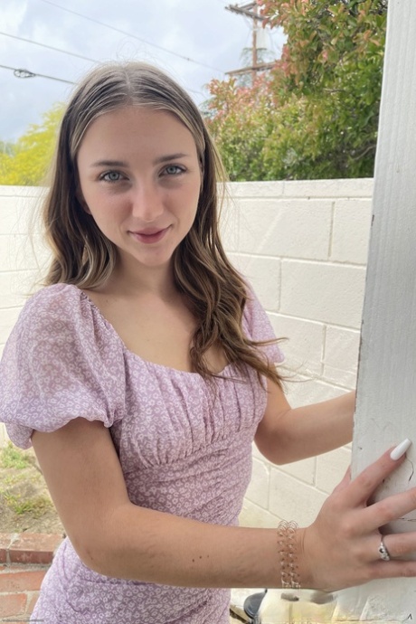 Beautiful teen Macy Meadows shows her tiny tits and presents her pussy