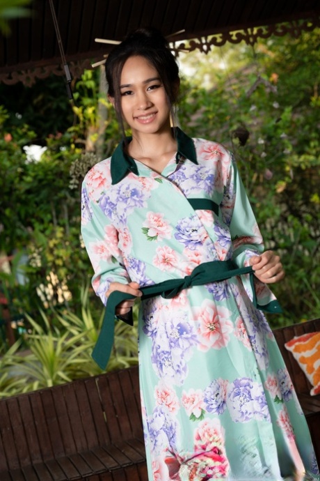 Adorable Asian teen Mayuko exposes her lovely big ass and hot pussy outdoors