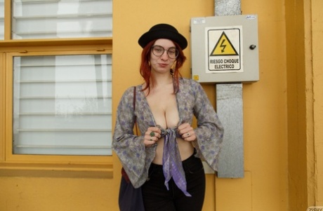 Argentinian babe with glasses Victoria Ramos strips & shows her big tits & ass