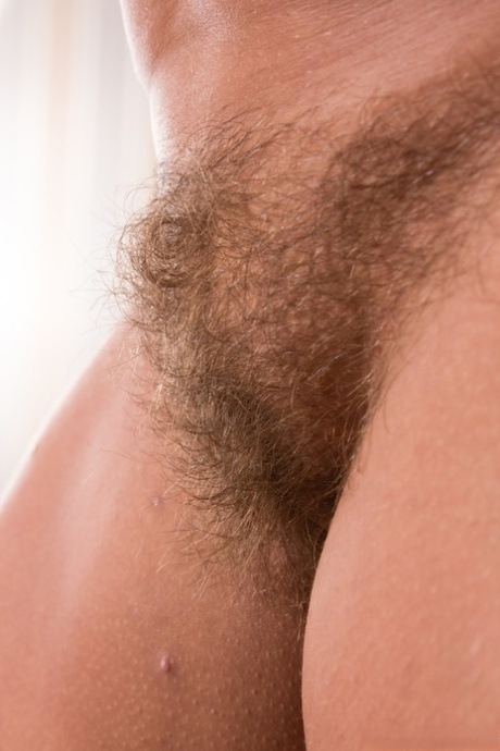 Hot blonde Lariona licks her puffy nipples & spreads her hairy muff up close