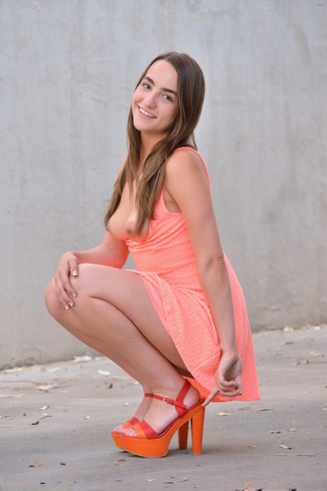 Sweet girlfriend with small breasts Jeri rides a baseball bat outdoors